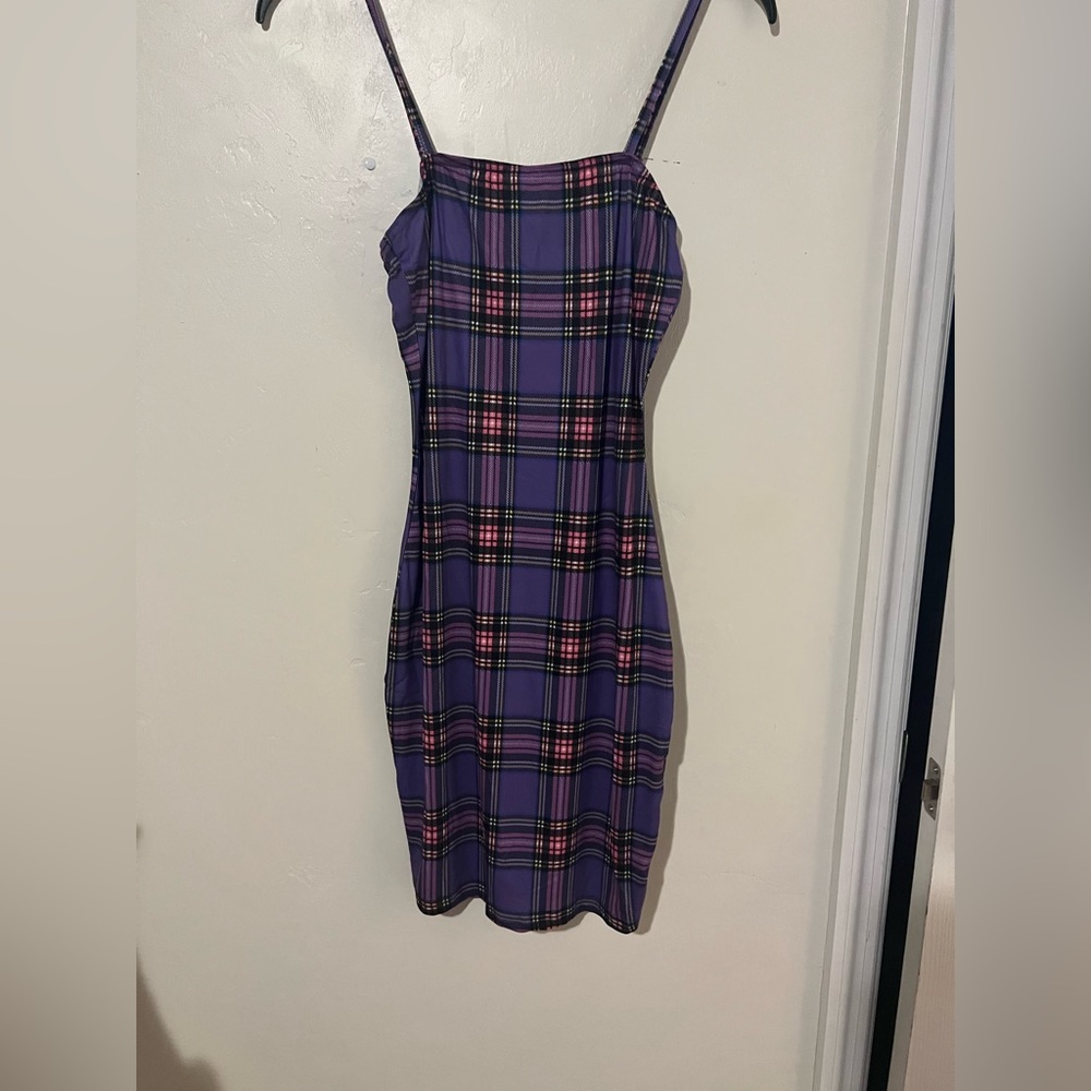 I’m selling a purple plaid tight dress